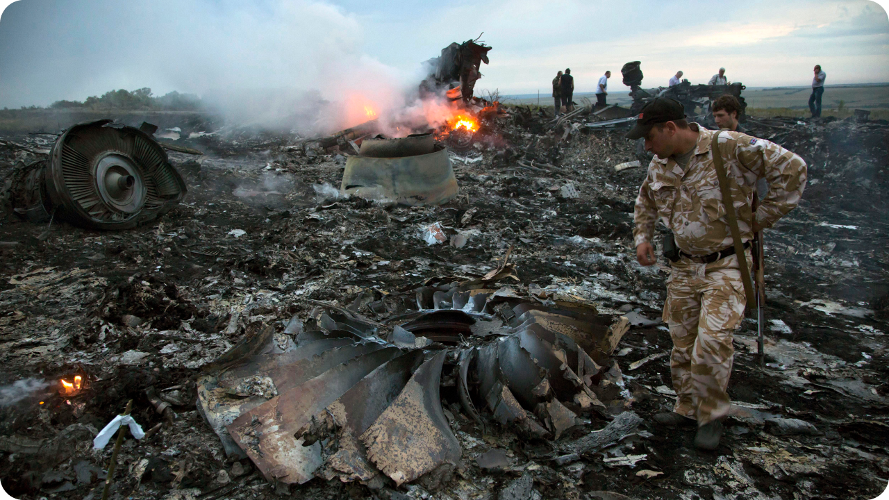 People around debris of MH17, Ukraine 2014